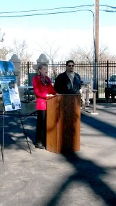 Supervisors MacGlashan and Serna at the podium.